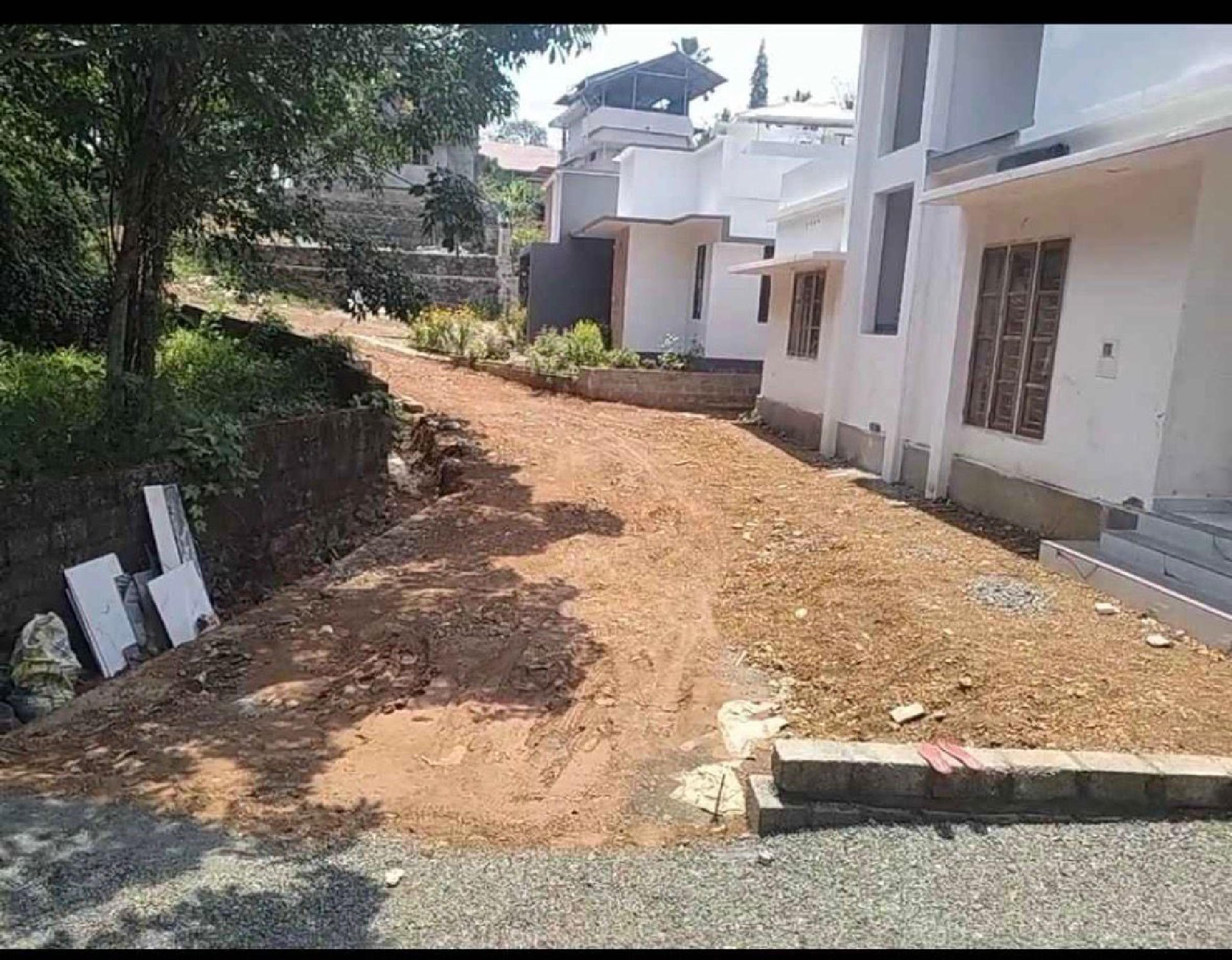 5.4 cent plot with 800 Sqr feet 2 bhk house for sale at Vennikulam  Thiruvankulam