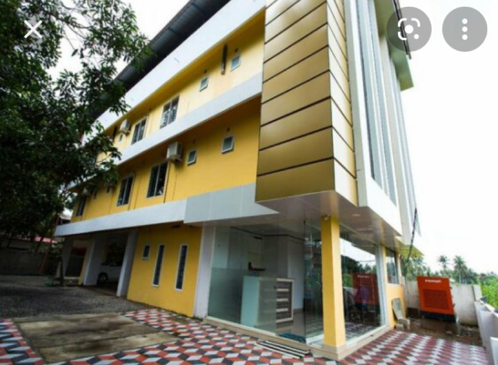 0.500 cent plot with 5800 sqft 15 rooms(12 double &amp; 3 single) lodge sale at Nedumbassery.